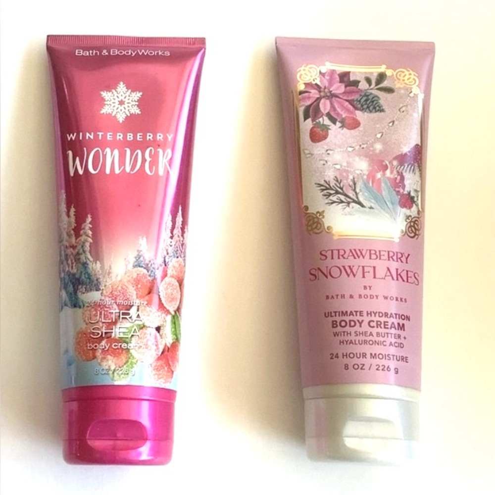 Bath & Body Works Body Cream in Strawberry Snowflake and Winterberry Wonder